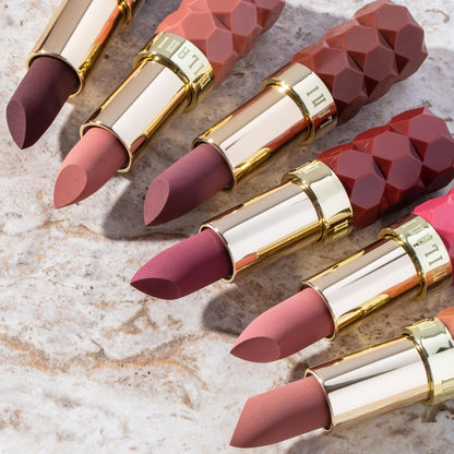 0.14 oz tube format with warm undertones and medium shade depth across the line