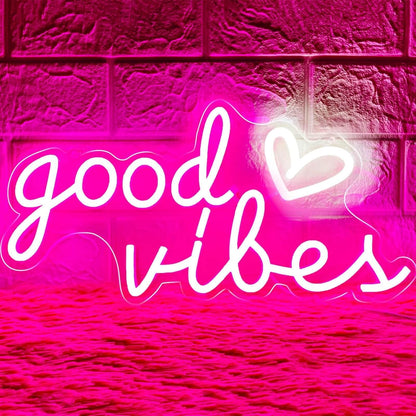 16"x8" heart-shaped led neon sign with 'good vibes' text and a white heart accent