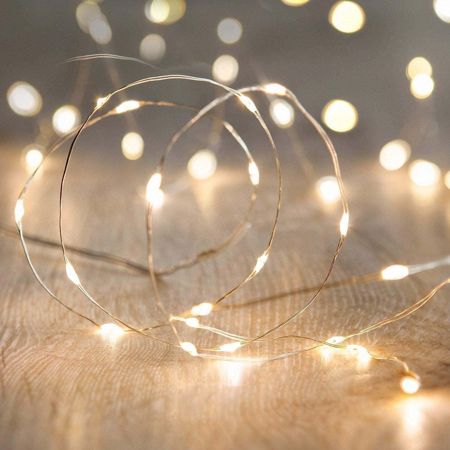 50 super-bright leds spaced 4 inches apart on 16.5ft silver ultra-thin copper wire