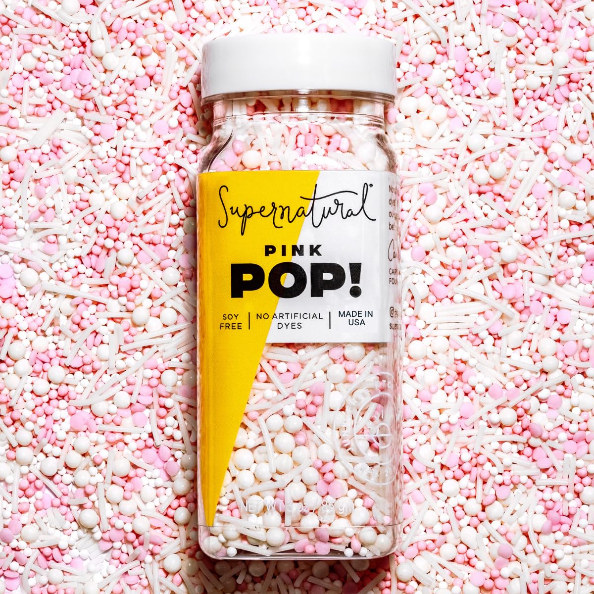 natural color blend of pink and peach nonpareils, pearls, and sugar strands