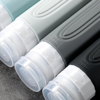 Voyageur Travel Size Bottles – Spill-Proof Hotel Toiletry Set, 3-Layer Leak-Proof 3oz Silicone Bottles for Worry-Free Packing