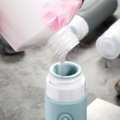 Voyageur Travel Size Bottles – Spill-Proof Hotel Toiletry Set, 3-Layer Leak-Proof 3oz Silicone Bottles for Worry-Free Packing